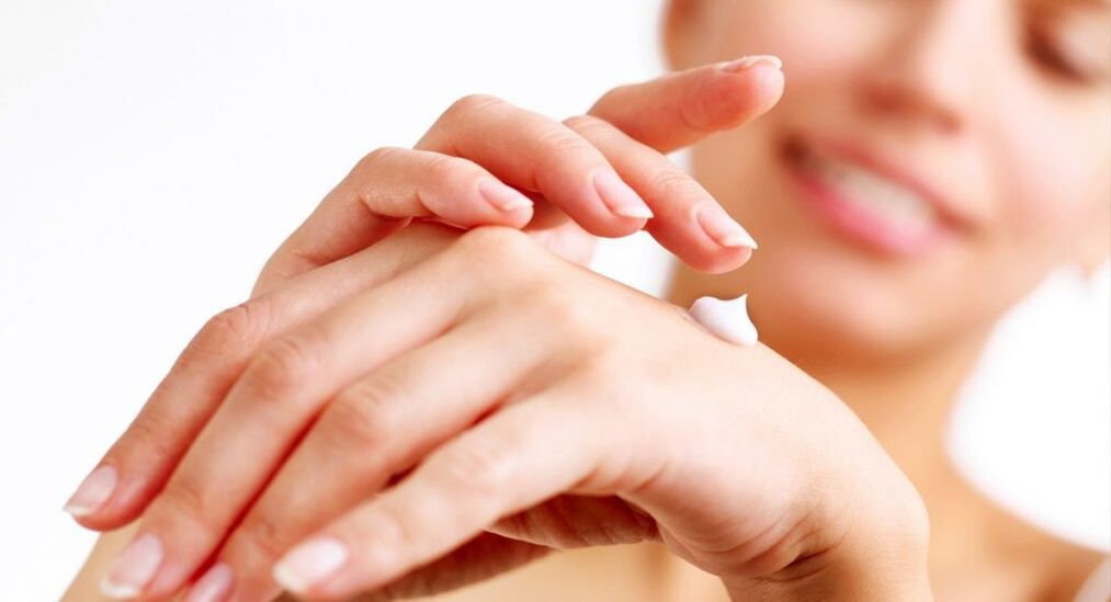 Apply hand cream to rejuvenate skin